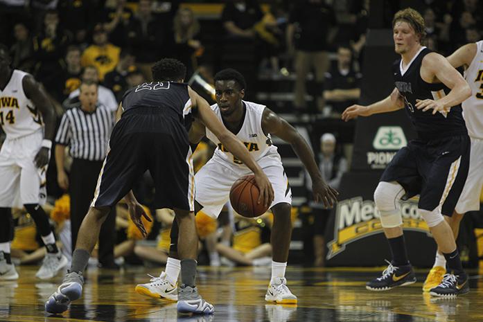 Iowa guard Anthony Clemmons guards Augustana guard Jordan Spencer in Carver-Hawkeye Arena on Friday, Nov. 6, 2015. The Vikings defeated the Hawkeyes, 76-74. (The Daily Iowan/Joshua Housing)