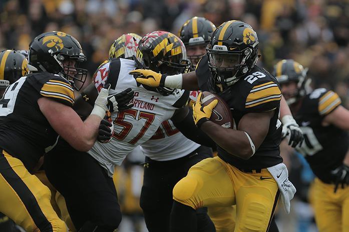Iowa running back LeShun Daniels, Jr. runs the ball during the game against Maryland in Kinnick Stadium on Oct. 31, 2015. The Hawkeyes defeated the Terrapins to stay undefeated, 31-15. (The Daily Iowan/Alyssa Hitchcock)
