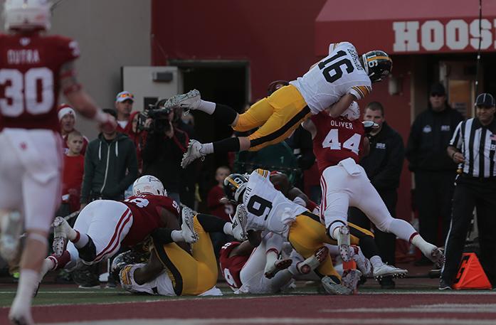 Iowa+quarterback+C.J.+Beathard+jumps+into+the+end+zone+during+the+Iowa-Indiana+game+in+Memorial+Stadium+in+Bloomington+on+Saturday%2C+Nov.+7%2C+2015.+The+Hawkeyes+stay+undefeated+after+beating+the+Hoosiers%2C+35-27.+%28The+Daily+Iowan%2FMargaret+Kipsert%29