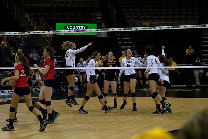 Iowa+womens+volleyball+team+cheers+as+they+score+a+point+in+a+game+at+Carver-Hawkeye+Arena+on+Saturday%2C+Oct.+31%2C+2015+in+a+game+against+the+Rutger+Scarlet+Knights.+Iowa+defeated+Rutger%2C+3-0%2C+their+first+major+win+in+weeks.+%28The+Daily+Iowan%2FRebecca+Bright%29