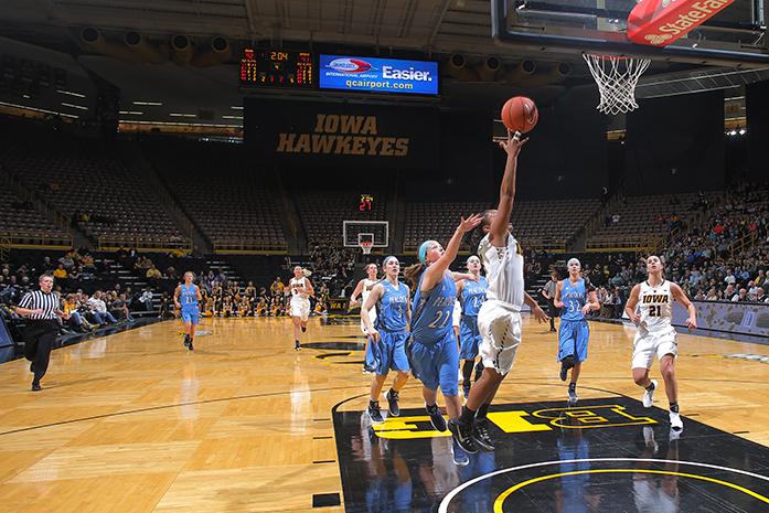 Tania Davis goes up for a lay up Sunday November 8th, 2015 at Carver Hawkeye Arena. The women played against Upper Iowa University in an exhibition contest. (The Daily Iowan/Kyle Close)