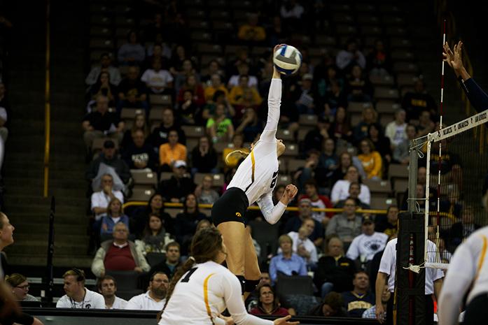 Iowa outside hitter Lauren Brobst hits the ball at Carver-Hawkeye Arena on Wednesday, Nov. 11, 2015. Iowa fell to Penn State, 3-0. (The Daily Iowan/Rachael Westergard)