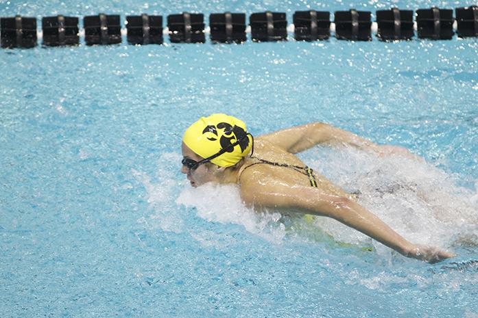  Izzie Bindseil competes in the  Womens 100 yard Butterfly in the 2014 Black and Gold Intrasquad meet on Saturday, Oct. 2014 at the CRWC. The Black squad defeated the Gold squad, 86.5 - 85.5. (The Daily Iowan/Joshua Housing)