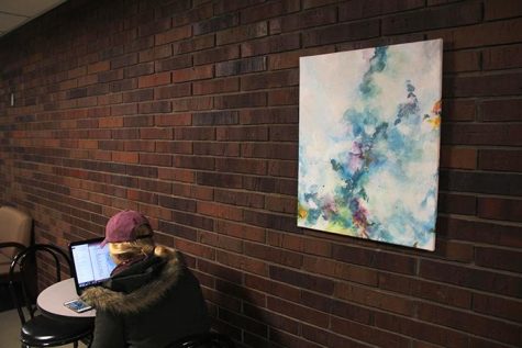 Student paintings are shown inside the EPB on Wednesday, Dec. 2, 2015. 