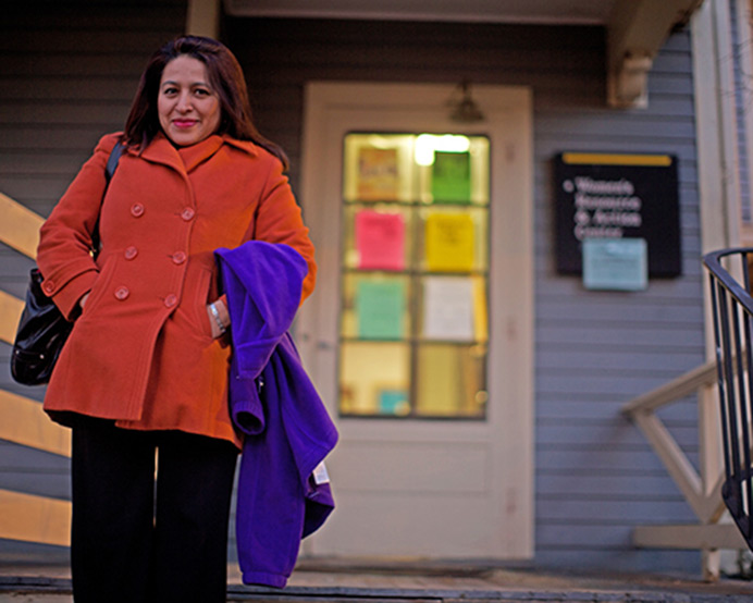 Gabriela Rivera leaves the goodbye party for the WRAC's blue house on, Thursday Dec 3, 2015. The Blue House that has been the center's headquarters since it's beginning will be demolished come January. (The Daily Iowan/Jordan Gale)