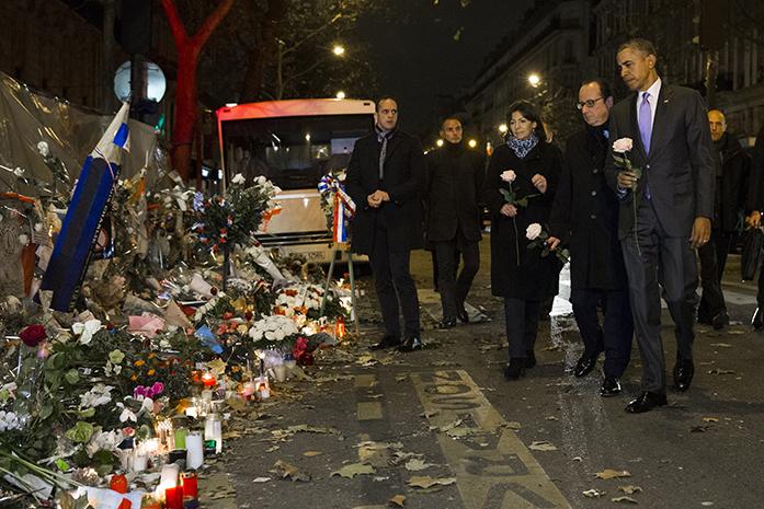 President+Barack+Obama%2C+right%2C+French+President+Francois+Hollande%2C+second+from+right%2C+and+Paris+Mayor+Anne+Hidalgo+arrive+at+the+Bataclan%2C+site+of+one+of+the+Paris+terrorists+attacks%2C+to+pay+their+respects+to+the+victims%2C+after+Obama+arrived+in+town+for+the+COP21+climate+change+conference%2C+on+Monday%2C+Nov.+30%2C+2015%2C+in+Paris.+%28AP+Photo%2FEvan+Vucci%29