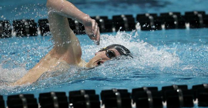Iowa swimmer Chris Dawson competes in the 500-yard free during the second day of the Mens Big Ten Swimming and Diving Championship in the Campus Recreation and Wellness Center on Thursday, Feb. 26, 2015. Dawson finished with a time of 4:23.65. (The Daily Iowan/Margaret Kispert)