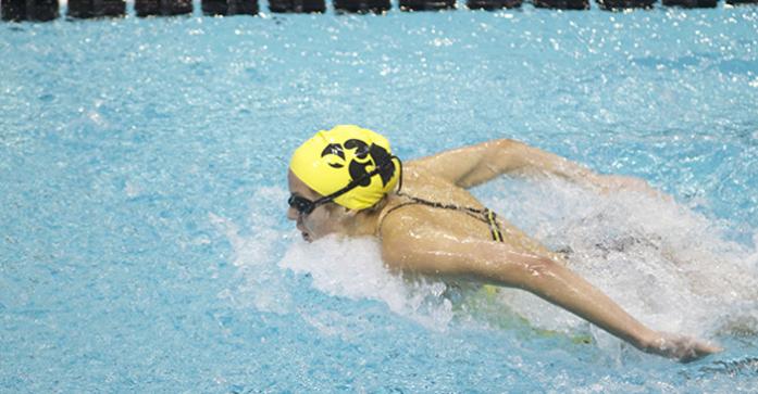 Iowa Freshman Izzie Bindseil competes in the  Womens 100 yard Butterfly in the 2014 Black and Gold Intrasquad meet on Saturday, Oct. 2014 at the CRWC. The Black squad defeated the Gold squad, 86.5 - 85.5. (The Daily Iowan/Joshua Housing)