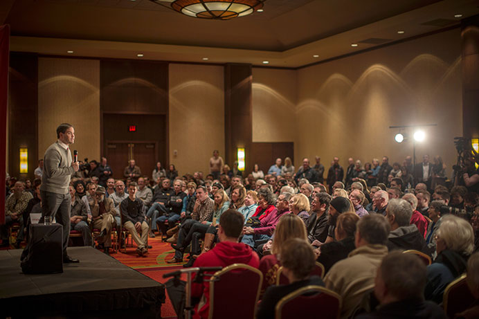 Sen. Marco Rubio speaks to a crowd at the Coralville Marriott on Monday. Among other topics, Rubio promised to repeal Obamacare. (The Daily Iowan/Jordan Gale)