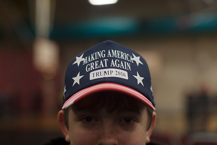A Donald Trump supporter wears a Trump 2016 hat at the Field House on Tuesday. Trump is in a close race in Iowa with Sen. Ted Cruz. (The Daily Iowan/Brooklynn Kascel)