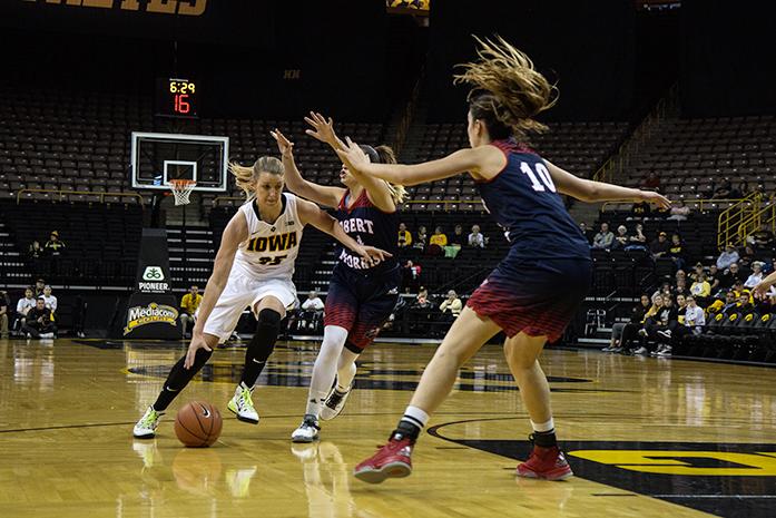 Iowa forward Kali Peschel drives the ball down the court against the Robert Morris defense, the Hawkeyes defeated the Colonials 69-50  at Carver-Hawkeye Arena in Iowa City,Iowa on Dec. 6,2015(The Daily Iowan/Anthony Vazquez)