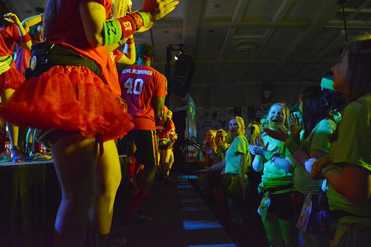 Moral captians start dancing on stage during the second hour of the 22nd Dance Marathon in the Iowa Memorial Union on Friday, Feb. 5, 2016. There are special events happening almost every hour to keep everyone motivated. (The Daily Iowan/Valerie Burke)