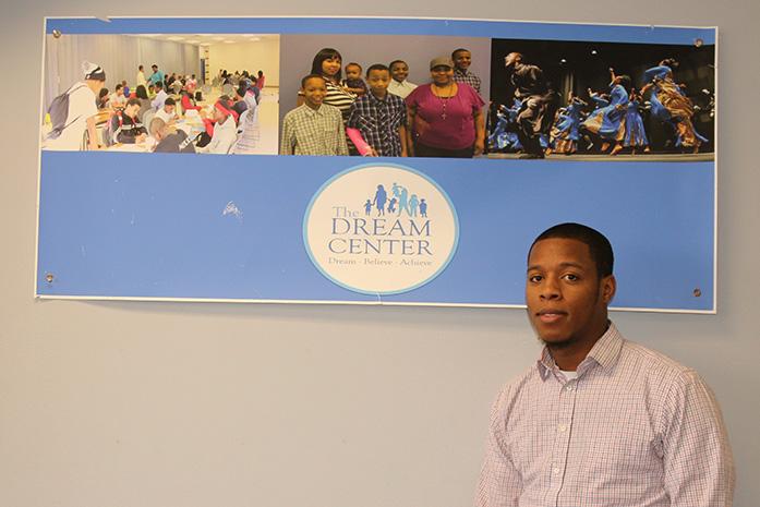 Fred Newell stands in front of a Dream Center banner on Feb. 11, 2016. Newell is the executive director of the Dream Center, an organization he founded to strengthen and empower families.