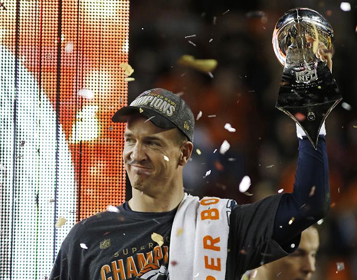 Denver Broncos’ Peyton Manning holds up the trophy after the NFL Super Bowl 50 football game against the Carolina Panthers, Sunday, Feb. 7, 2016, in Santa Clara, Calif.  The Broncos won 24-10. (AP Photo/Matt Slocum)