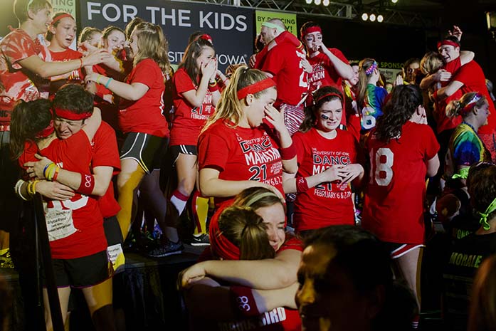 Morale Captains celebrate after finding out the amount of money raised during the final moments of Dance Marathon in the IMU on Saturday, Feb. 7, 2015. Dance Marathon raised over $2 million for kids with cancer. (The Daily Iowan/Peter Kim)