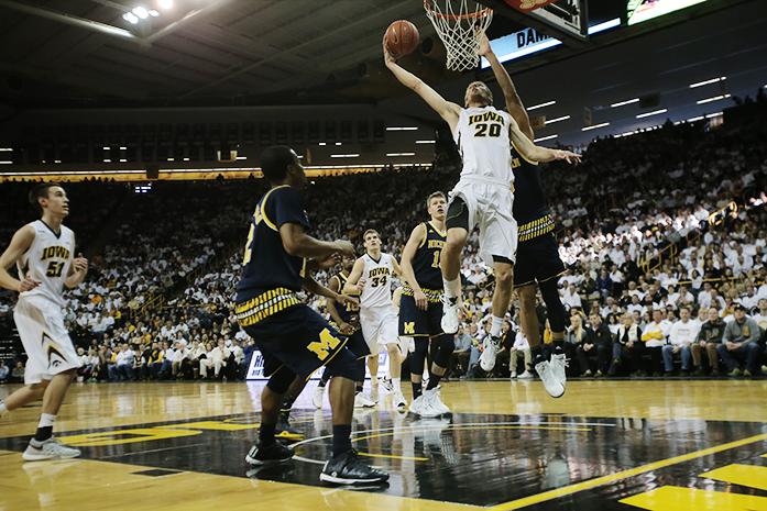 Iowa forward Jarrod Uthoff goes up for a basket during the Iowa-Michigan game in Carver-Hawkeye Arena on Sunday, Jan. 17, 2015. The Hawkeyes defeated the Wolverines, 82-71. (The Daily Iowan/Margaret Kispert)