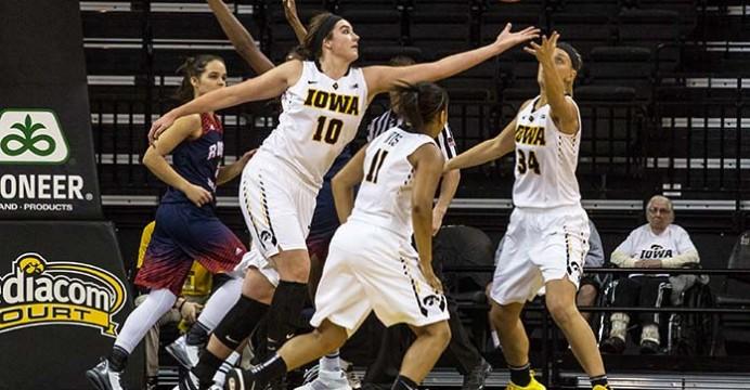 Iowa+forward+Megan+Gustafson+and+Iowa+forward+Carly+Mohns+reach+for+the+rebound%2C+the+Hawkeyes+defeated+the+Colonials+69-50++at+Carver-Hawkeye+Arena+in+Iowa+City%2CIowa+on+Dec.+6%2C2015%28The+Daily+Iowan%2FAnthony+Vazquez%29