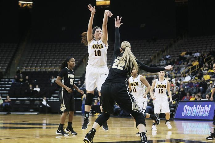 Iowa forward Megan Gustafson takes a shot over Purdue center Bree Horrocks on Thursday Feb. 18, 2016. The Hawkeyes defeated the Boilermakers 63-55 in Carver Hawkeye Arena. (The Daily Iowan/ Alex Kroeze)