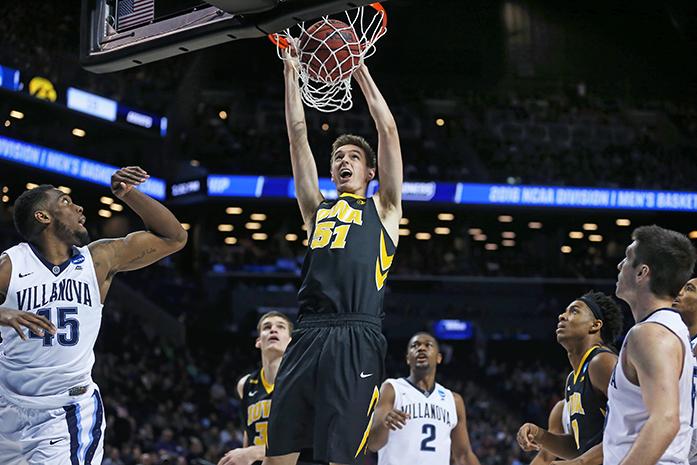 Iowa+Hawkeyes+forward+Nicholas+Baer+%2851%29+dunks+the+ball+against+the+Villanova+Wildcats+in+the+Barclays+Center+on+Sunday%2C+March+20%2C+2016+in+Brooklyn%2C+New+York.+Baer+finished+the+game+with+4+rebounds%2C+15+points%2C+and+2+steals.+The+Wildcats+defeated+the+Hawkeyes%2C+87-68.+%28The+Daily+Iowan%2FJoshua+Housing%29