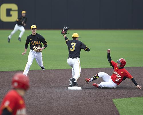 Iowa infielder Nick Roscetti steps on second to end the inning at Duane Banks Field on Saturday, March 26, 2016. The Hawkeyes erased a 1-0 deficit in the bottom of the 8th scoring 4 runs to beat the Terrapins 4-1. (The Daily Iowan/ Alex Kroeze)