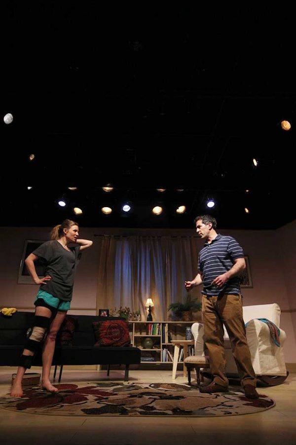Heather Chrisler (left) and Sam Osheroff (right) dance in character Senga Quinns living room during a rehearsal for the play Dancing Lessons at Riverside Theatre on Tuesday, March 29, 2016. Dancing Lessons follows a broadway dancer (Senga Quinn), and a professor (Ever Montgomery) with Aspergers Syndrome learning to dance. (The Daily Iowan/Jordan Gale)