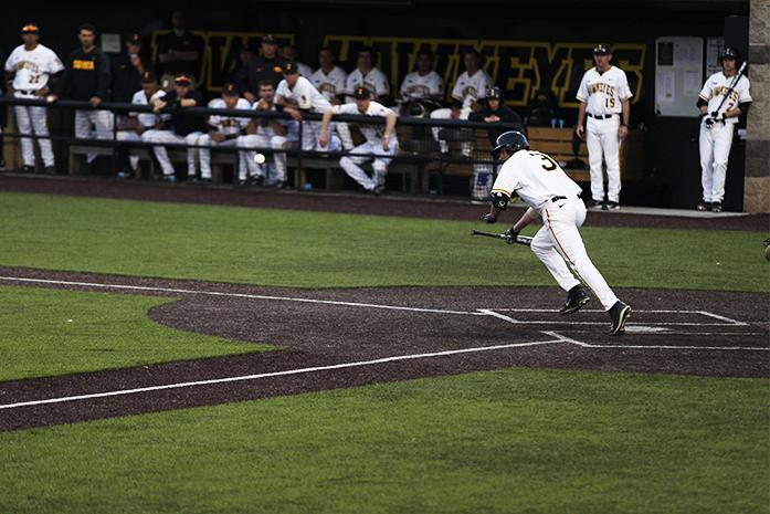 Iowa infielder Nick Roscetti runs to first base during the Iowa vs. Cornell College game at Duane Banks Field on Wednesday, April 15, 2015. Iowa beat Cornell College, 9-1. (The Daily Iowan/Mikaela Parrick)