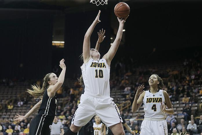 Iowa forward Megan Gustafson takes the lay up on Thursday Feb. 18, 2106. The Hawkeyes defeated the Boilermakers 63-55 in Carver Hawkeye Arena. (The Daily Iowan/ Alex Kroeze)