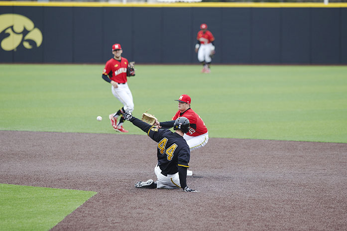 Iowa outfielder Robert Neustrom slides into second at Duane Banks Field on Saturday, March 26, 2016. The Hawkeyes erased a 1-0 deficit in the bottom of the 8th scoring 4 runs to beat the Terrapins 4-1. (The Daily Iowan/ Alex Kroeze)