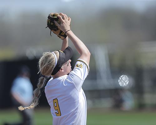 Iowa third baseman Sarah Kurtz catches an infield pop-up during the Iowa-Wisconsin game at Bob Pearl Field on Sunday, April 17, 2016. The Hawkeyes lost to the Badgers, 3-1. (The Daily Iowan/Margaret Kispert)