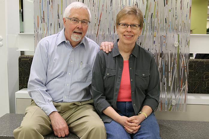Jim Fluck and Julie Scott are featured in a photo at the UI Main Library on Wednesday, April 27, 2016. Former employees of the university, they have made $2.7 million in donations to support many areas across campus.  (The Daily Iowan/Tawny Schmit)