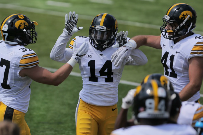 Both+Iowa+teams+lineup+for+the+first+snap+during+the+Spring+Game+at+Kinnick+Stadium+on+April+23.+The+defense+beat+the+offense%2C+20-18.+%28The+Daily+Iowan%2FAlex+Kroeze%29
