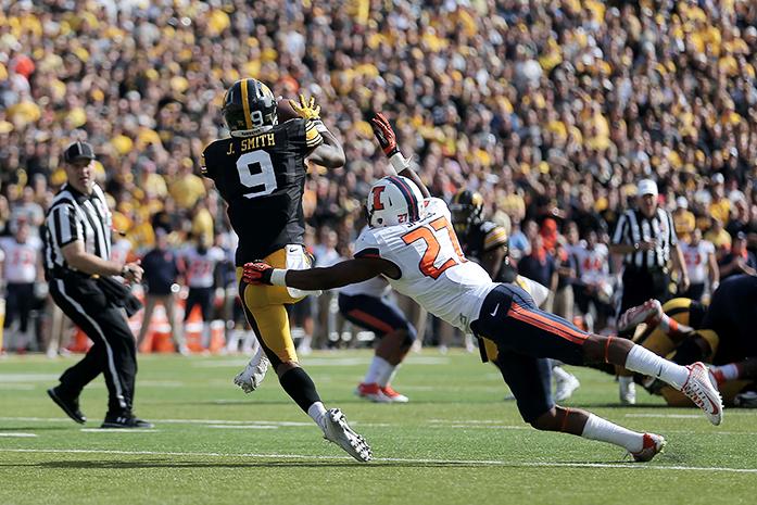 Iowa Jerminic Smith attempts to recieve the ball during the Homecoming game against Illinois in Kinnick Stadium on Saturday, October 10, 2015. The pass was incomplete. Smith received for a total of  118-yards on the game. The Hawkeyes defeated the Illini, 29-20. (The Daily Iowan/Alyssa Hitchcock)