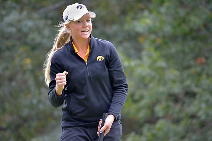 Iowa golfer Jessie Sindlinger celebrates after a putt at the Diane Thomason Invitational at Finkbine Golf Course on Saturday and Sunday Oct. 4-5, 2014. The Illinois Fighting Illini took first in the tournament, beating Iowa by 14 strokes. (The Daily Iowan/Valerie Burke)