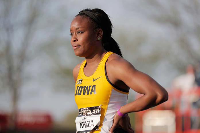 Iowas Lake Kwaza cools down after running the womens 200 meter race at the Musco Twilight Invitational at Cretzmeyer Track in Iowa City on Saturday, May 2nd. Kwaza placed first in the event with a time of 23.60. (The Daily Iowan;Rachael Westergard)