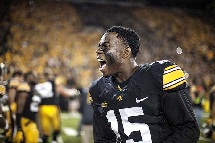 Hawkeye freshmen Joshua Jackson cheers as the team takes the field on Saturday, Sept. 19, 2015. The Hawkeyes defeated the Pittsburgh Panthers 27-24 on a last second field goal. (The Daily Iowan/Sergio Flores)