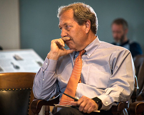 UI president Bruce Harreld listens to the other panelists at the Old Capitol Museum on Monday, May 2, 2016. The panels discussed numerous topics including social justice and themed semester program. (The Daily Iowan/Peter Kim)