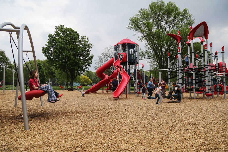 Iowa+City+residents+watch+their+children+as+the+play+on+Iowa+Citys+newest+playground+at+Mercer+Park+in+Iowa+City%2CIowa+on+Wednesday%2C+May+11%2C+2016.+The+official+opening+of+the+park+was+declared+with+a+ribbon+cutting+ceremony.+%28The+Daily+Iowan%2FAnthony+Vazquez%29