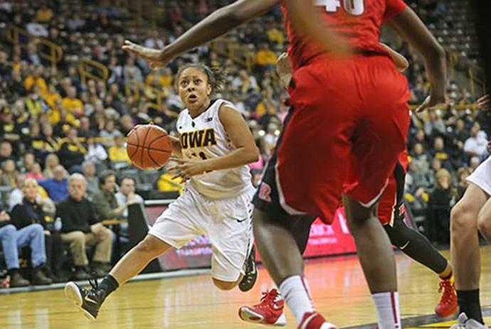 Iowa guard Tania Davis drives to the basket during the Iowa-Rutgers game in Carver-Hawkeye on Jan. 4. The Hawkeyes defeated the Scarlet Knights, 69-65. (The Daily Iowan/Margaret Kispert)