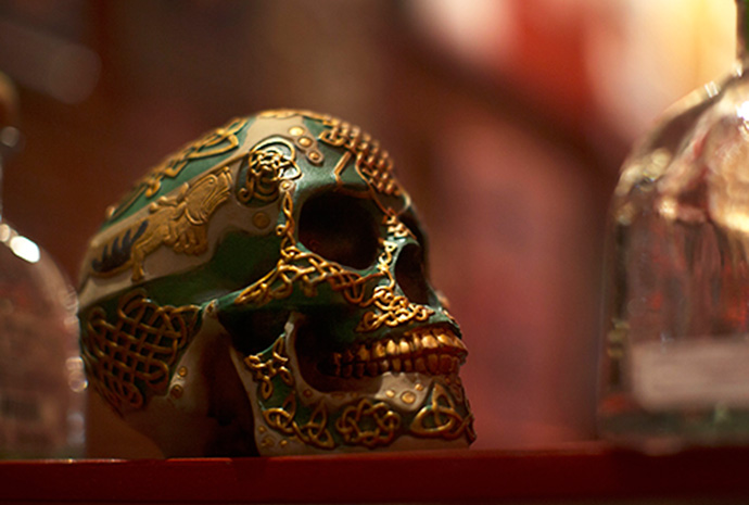 Skulls and empty patron bottles are used as decor for El Patron, a new Mexican tequila bar and restaurant on the Ped Mall on Wednesday, June 29, 2016. Most of the skulls in the bar had to be hand picked up from Mexico. (The Daily Iowan/Margaret Kispert)