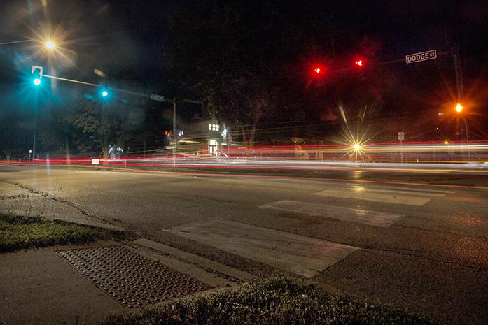 A long exposure illuminates the stop lights on the corner of Dodge and Church in Iowa City on Wednesday. In an effort to increase safety, Iowa City police hope to install more cameras throughout the city. (The Daily Iowan/Brooklynn Kascel)