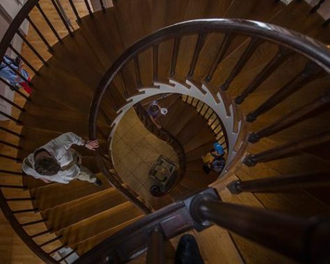 People walk down the spiral staircases of the Old Capitol on Sunday, July 3, 2016. 