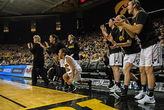 The Iowa bench cheers as one of their teammates scores, the Hawkeyes defeated the Colonials 69-50  at Carver-Hawkeye Arena in Iowa City,Iowa on Dec. 6,2015(The Daily Iowan/Anthony Vazquez)