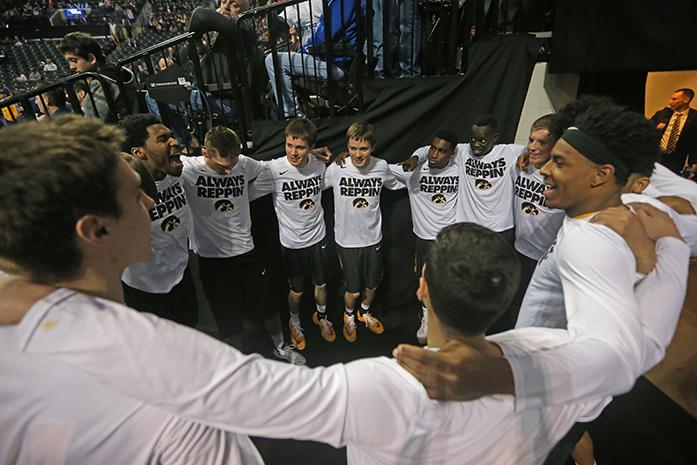 The Iowa Hawkeyes huddle outside the tunnel before facing off against the Villanova Wildcats in the Barclays Center on Sunday, March 20, 2016 in Brooklyn, New York. The Hawkeyes finished the game with 13 turnovers. The Wildcats defeated the Hawkeyes, 87-68. (The Daily Iowan/Joshua Housing)