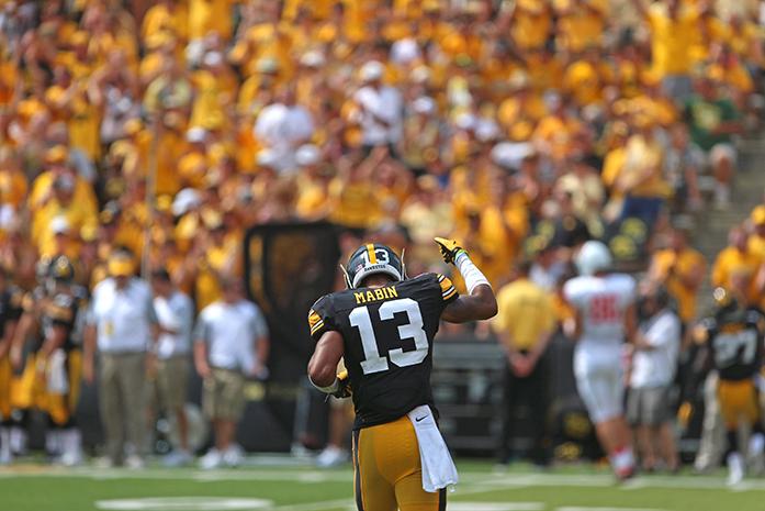 Iowa defensive back Greg Mabin runs to the sidelines in Kinnick Stadium on Saturday, Sept. 5, 2015. The Hawkeyes defeated the Redbirds, 31-14.