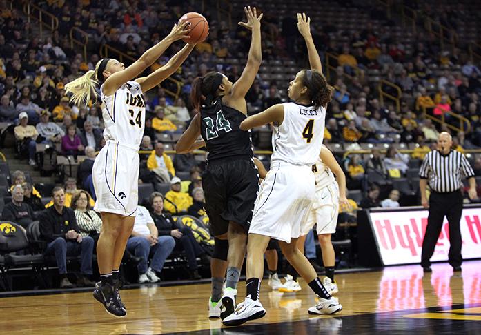 Iowa forward Carly Mohns grabs a defensive rebound during the Iowa-Upstate game in Carver-Hawkeye Arena on Friday, Nov. 14, 2014. The Hawkeyes dominated the Spartans, 107-56. (The Daily Iowan/Margaret Kispert)