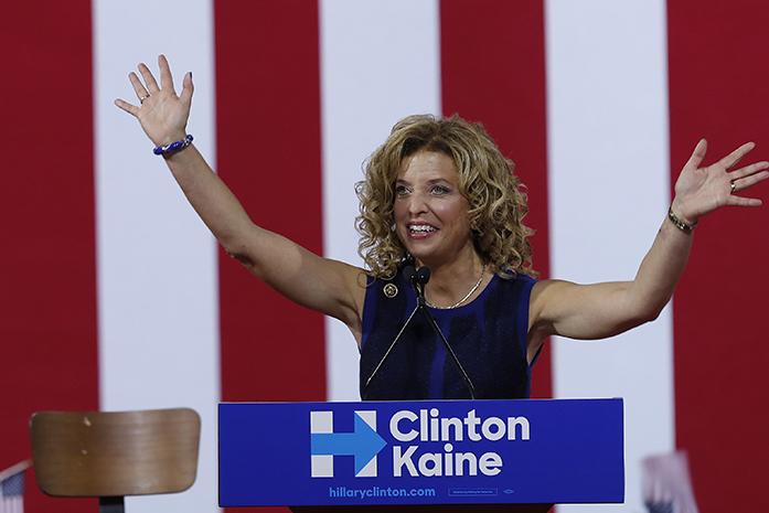 In this Saturday, July 23, 2016 photo, DNC Chairwoman, Debbie Wasserman Schultz speaks during a campaign event for Democratic presidential candidate Hillary Clinton during a rally at Florida International University Panther Arena in Miami.  On Sunday, Wasserman Schultz announced she would step down as DNC chairwoman at the end of the party's convention, after some of the 19,000 emails, presumably stolen from the DNC by hackers, were posted to the website Wikileaks. (AP Photo/Mary Altaffer)