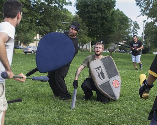 Dagorhir combatants battle with weapons made of fiberglass or wood cores with padding at College Green Park in Iowa City, Wednesday, July 20, 2016. The dagorhir battle game is technically a sport. This medieval combat society holds battle games every Wednesday and Sunday from 4 to 6 pm at College Green Park. (The Daily Iowan/Ting Xuan Tan)