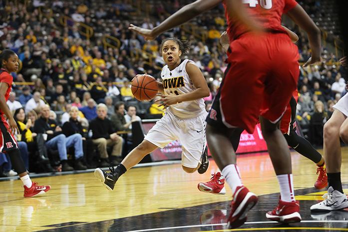 Iowa guard Tania Davis drives to the basket during the Iowa-Rutgers game in Carver-Hawkeye Arena on Monday, Jan. 4, 2016. The Hawkeyes defeated the Scarlet Knights, 69-65. (The Daily Iowan/Margaret Kispert)