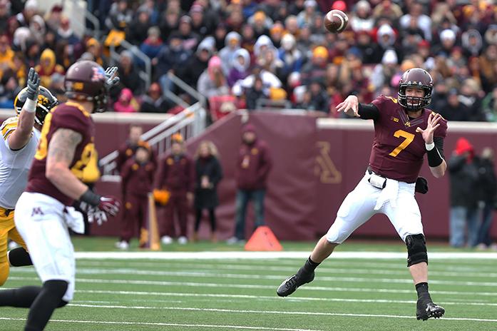 Minnesota quarterback Mitch Leicher throws a pass to tight end Maxx Williams in TCF Bank Stadium on Saturday, November 8, 2014 in Minneapolis, Minnesota. Leidner threw for 138-yards and went 10-13 passing on the game. The Gophers dominated the Hawkeyes, 51-14 to reclaim the Floyd of Rosedale trophy. (The Daily Iowan/Tessa Hursh)