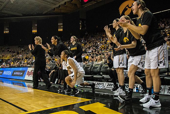 The Iowa bench cheers as one of their teammates scores, the Hawkeyes defeated the Colonials 69-50  at Carver-Hawkeye Arena in Iowa City,Iowa on Dec. 6,2015(The Daily Iowan/Anthony Vazquez)